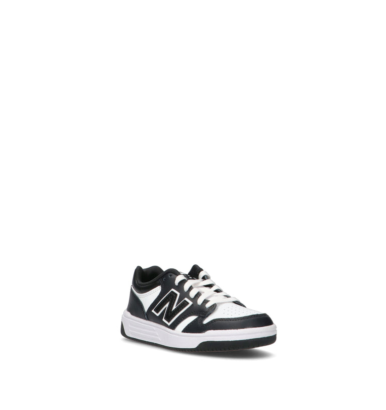 NEW BALANCE Sneaker bimbo nera/bianca in pelle