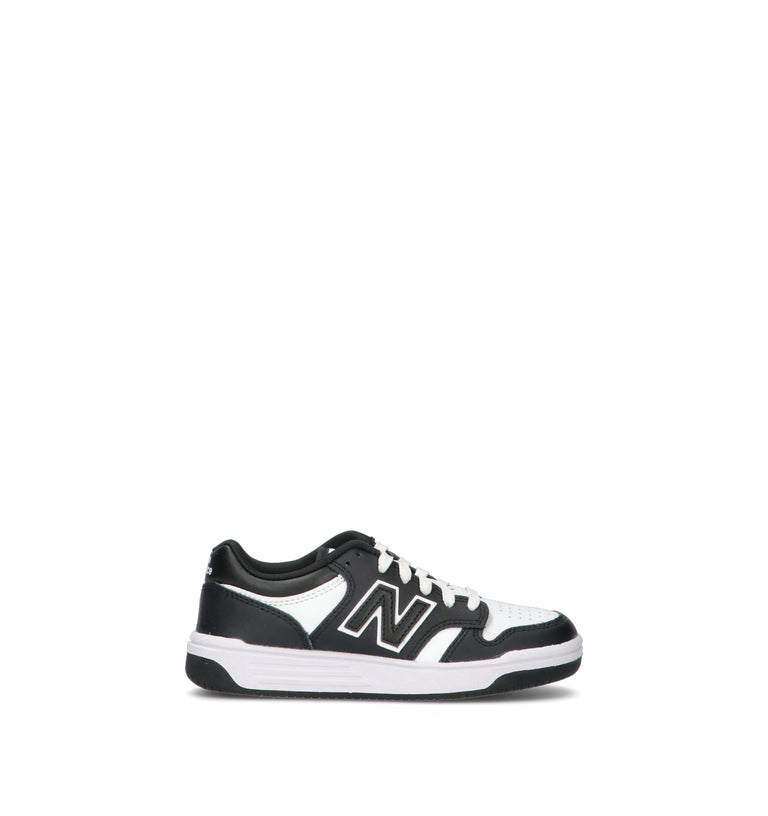 NEW BALANCE Sneaker bimbo nera/bianca in pelle