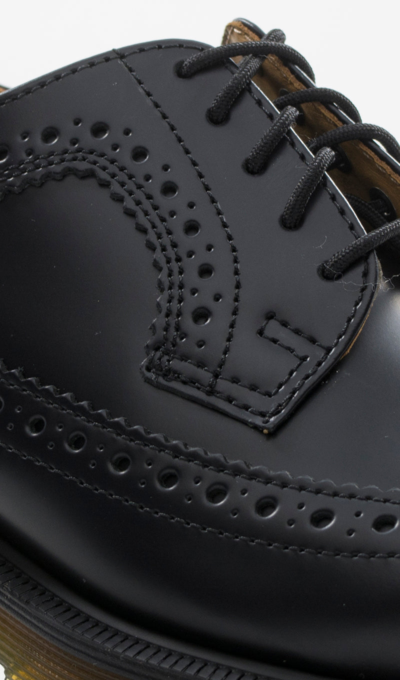 DR. MARTENS Stringata donna nera in pelle brogue