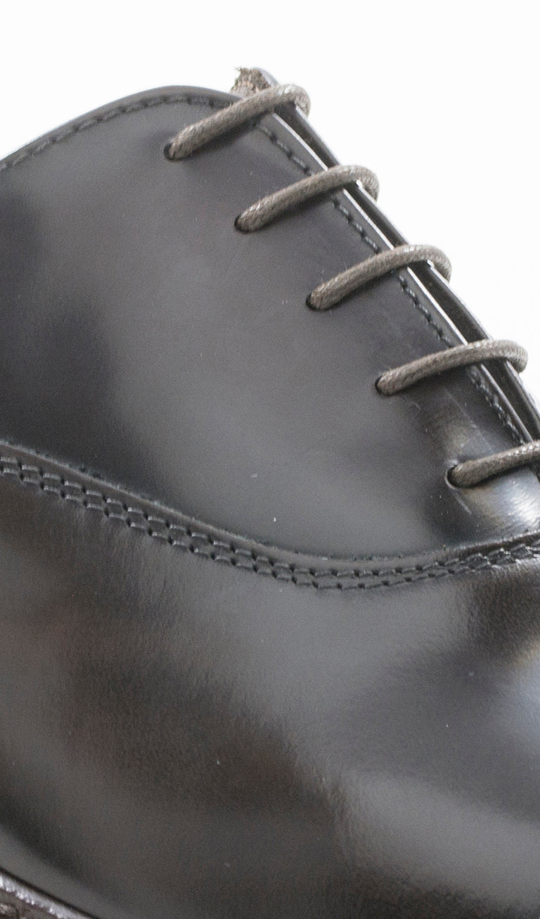 HOLE B. Stringata uomo marrone in pelle