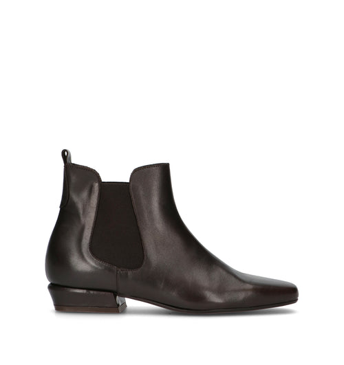 PHIL MELVIS Beatles donna testa di moro in pelle